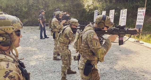 Handlers learn advanced close quarter rifle techniques.