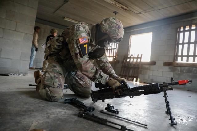 U.S. Army Sgt. Timothy Brooks of Squad 7, representing the U.S. Army Reserve, attempts to assemble an M240L machine gun during the Army’s first-ever Best Squad Competition on Fort Bragg, North Carolina, Oct 4, 2022. The Army Best Squad Competition tests soldiers on their individual and collective ability to adapt to and overcome challenging scenarios and battle-readiness events that test their physical endurance, technical skills, and tactical abilities under stress and extreme fatigue.