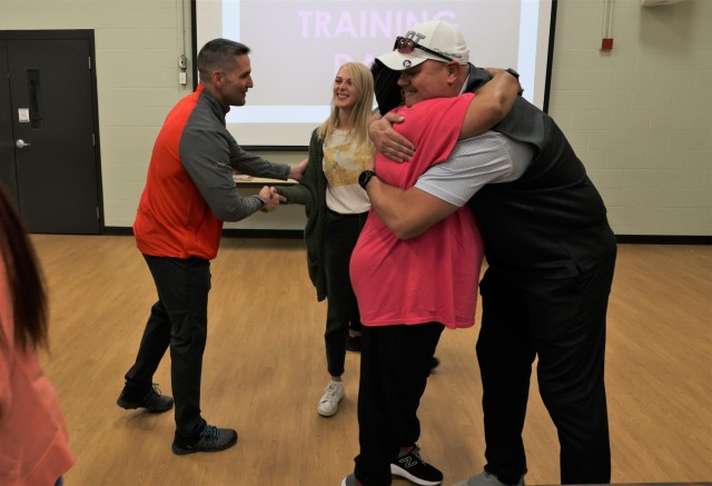 Fort Knox Garrison Commander Col. Lance O’Bryan and Command Sgt. Maj. William Fogle praise members of the Child Development Center team during the presentation of the National Association for the Education of Young Children reaccreditation...