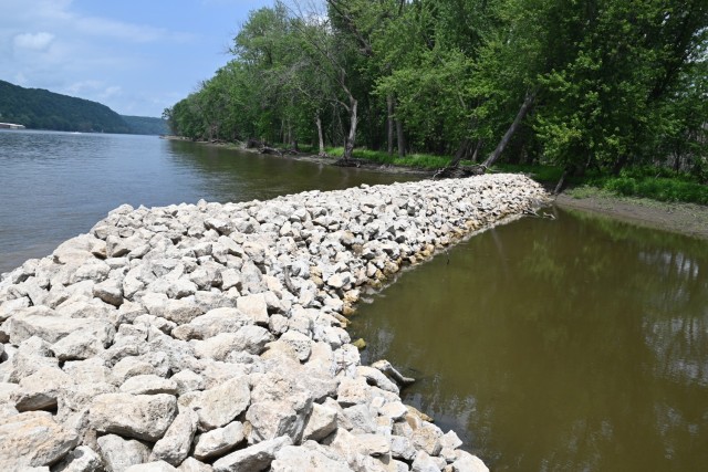 The U.S. Army Corps of Engineers, St. Paul District, in partnership with the  Upper Mississippi River National Wildlife & Fish Refuge, the Wisconsin Department of Natural Resources, Iowa Department of Natural Resources, and Minnesota Department of Natural Resources is continuing construction at McGregor Lake near Prairie du Chien, Wisconsin and Marquette, Iowa, to create islands to restore floodplain forest habitat for wildlife, including migratory birds. The partners had a site visit to view progress July 5. 