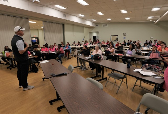 Fort Knox Garrison Command Sgt. Maj. William Fogle addresses members of the Child Development Center team regarding the National Association for the Education of Young Children reaccreditation on Oct. 7, 2022.