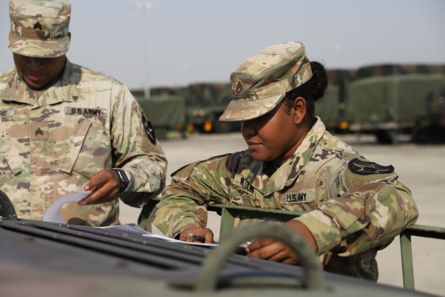 U.S. Army Staff Sgt. Desirae Williams assigned to Headquarters Company, Division Special Troops Battalion, 2nd Infantry Division Sustainment Brigade, 2nd Infantry Division/ROK-U.S. Combined Division leads vehicle inventories with her Soldiers at Camp Humphreys, Republic of Korea, Sept. 26, 2022. Williams is an 89B, Ammunitions Specialist, serving as the land and ammo noncommissioned officer for DSTB. (U.S. Army photo by Sgt. Evan Cooper)