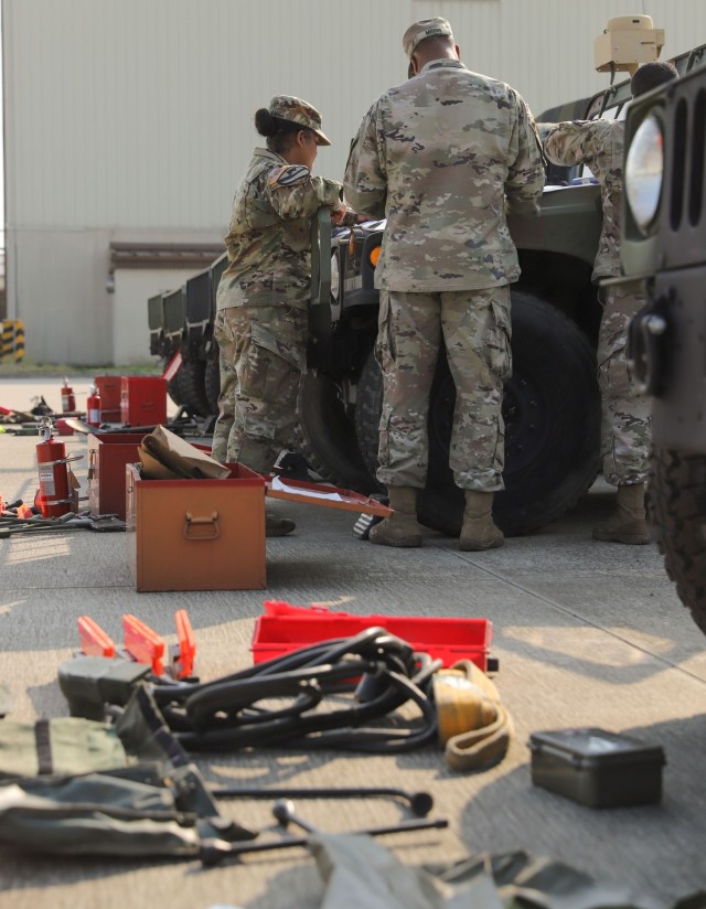 U.S. Army Staff Sgt. Desirae Williams assigned to Headquarters Company, Division Special Troops Battalion, 2nd Infantry Division Sustainment Brigade, 2nd Infantry Division/ROK-U.S. Combined Division leads vehicle inventories with her Soldiers at Camp Humphreys, Republic of Korea, Sept. 26, 2022. Williams is the first person in her family to join the military. (U.S. Army photo by Sgt. Evan Cooper)