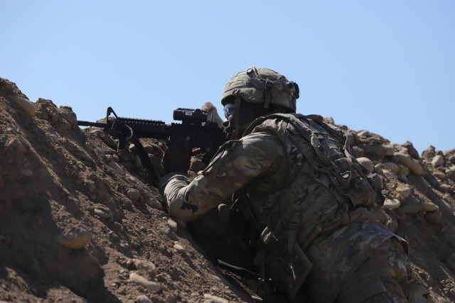 A U.S. Soldier assigned to the 643rd Engineer Support Company, 11th Engineer Battalion, 2nd Infantry Division Sustainment Brigade, 2nd Infantry Division/ROK-U.S. Combined Division, pulls guard while reacting to indirect fire at Dagmar North, South Korea, Sept. 28, 2022. The training exercise was called “Wolf Pack Howl.” (U.S. Army photo by Sgt. Evan Cooper)