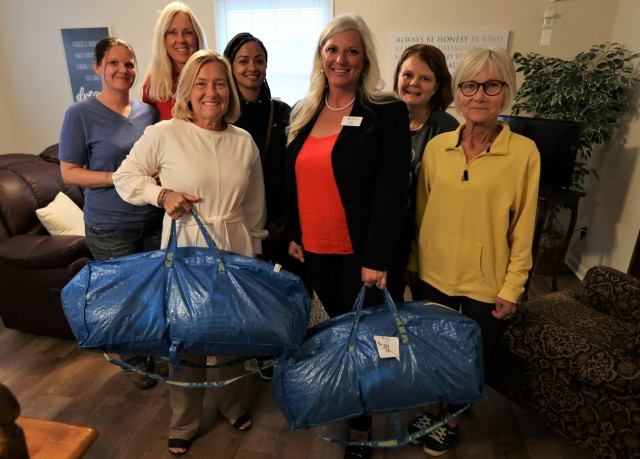 Volunteers from the Fort Knox Red Cross Warrior Warehouse drop off a large donation of women’s clothing Oct. 12, 2022, to Kentucky Rep. Nancy Tate at the Ciara’s House transitional home for women in Brandenburg.