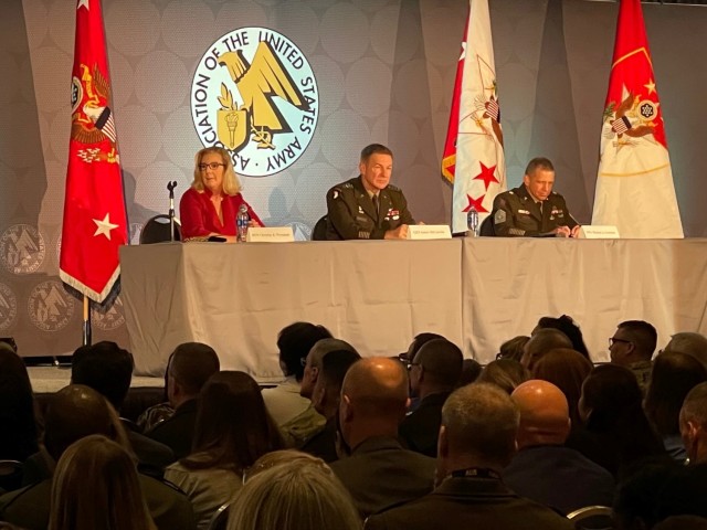 The panel members for Association of the U.S. Army that focused family issues, Secretary of the Army Christine E. Wormuth, Chief of Staff of the Army Gen. James McConville and Sgt. Maj. of the Army Michael Grinston, wait for a question to be asked.  