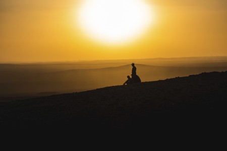 Soldiers watch a sunrise during Eager Lion, a multilateral exercise, in Jordan, Sept, 13, 2022.