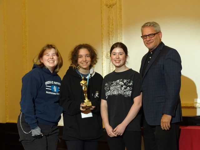 The Ansbach Youth Troupe receives the award for Outstanding YouthFEST Show from Jeff Wertz, IMCOM-Europe DFMWR director, Oct. 9 during the award ceremony for YouthFEST &#39;22 at USAG Ansbach. 