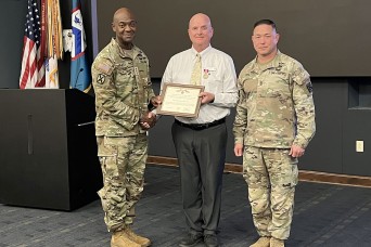 CAC CG recognizes Civilian for years of work on Combat Training Center program