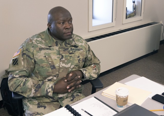 Command Sgt. Maj. John Brown, senior enlisted Soldier for 1-362 Air Defense Artillery, gets some pointers on how to best facilitate an After Action Review during classroom training at the First Army OC/T Academy on Rock Island Arsenal, Ill.