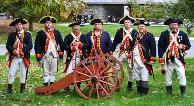 Members of the Saratoga Battle Chapter of the Sons of the Revolution pose for a photo, with their cannon, prior to the dedication of a memorial stone for Private Oliver Barrett at the Saratoga National Cemetery on October 19, 2022.  Barrett volunteered as a Minuteman and died serving under the 10th Massachusetts Regiment in the Battle of Saratoga on October 7, 1777, at 51 years of age. Barrett lies in an unmarked grave on the Saratoga Battlefield and was honored with a memorial stone at the ceremony. (U.S. Army National  Guard photo by SSG Matthew Gunther)