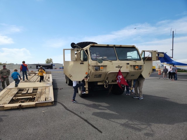 Kids at the event enjoyed the unique opportunity to climb into the driver&#39;s seat and ask questions about the military vehicles.