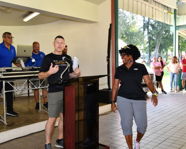 Fort Buchanan Garrison Commander Col. Tomika M. Seaberry was in disguise, sitting amongst the workforce and heckling in fun the Garrison Command Sgt. Maj. Roderick W. Hendricks and Deputy to the Garrison Commander, Yvette L. Castro as the made their welcome remarks.