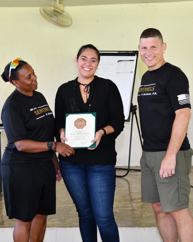 Internal Review and Audit Compliance Officer, Katsi Y. Rivera Medina received the Ten Years of Service to the Nation certificate and pin during the Town Hall.