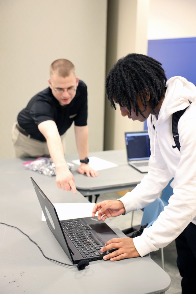 ODENTON, Md. – Soldiers and Civilians representing the 780th Military Intelligence Brigade (Cyber) partnered with Anne Arundel County Public Library to host a STEM (Science, Technology, Engineering, and Math) and cybersecurity event for teens...