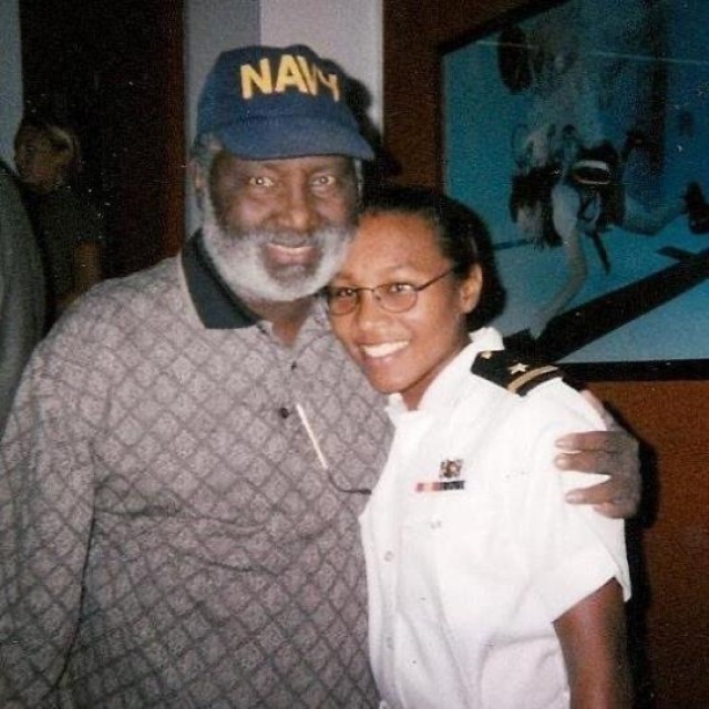 Sanders with her father, a U.S. Navy Veteran, after graduating from U.S. Navy Dive School. 