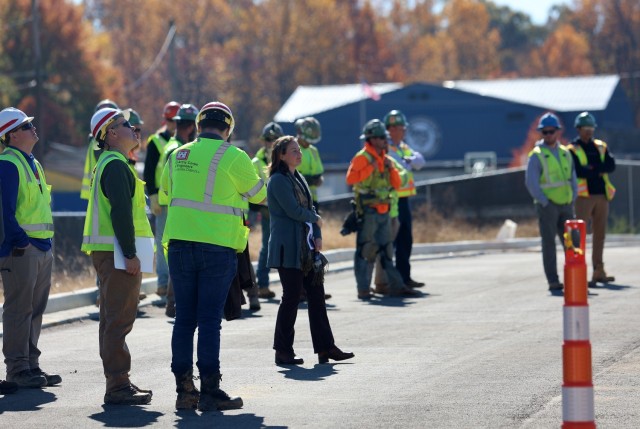 Contractor bolts last steel beam to new Van Voorhis Elementary School