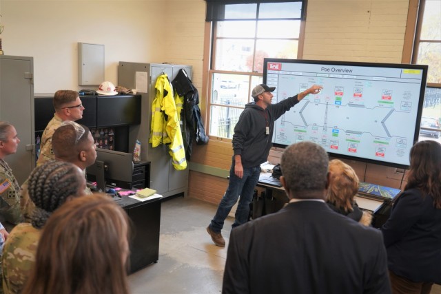 Pete Sporte, a maintenance mechanic supervisor working for the U.S. Army Corps of Engineers’ Soo Locks facility in Sault Ste. Marie, Mich., presents automation information to U.S. Army Tank-automotive and Armaments Command senior leaders and commanders during a tour of the historic locks operations Oct. 25. 