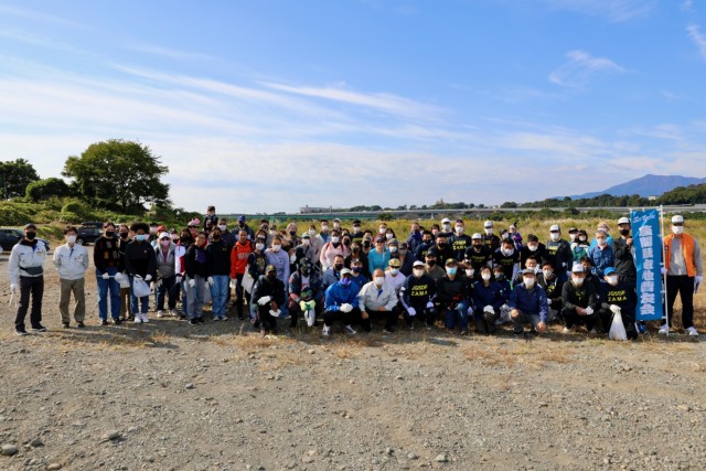 Volunteers pose for a group photo at an off-post community cleanup Oct. 30, 2022, at the Sagamihara City Shindo Sports Ground near Camp Zama, Japan. About 40 volunteers from Camp Zama joined Sagamihara City, Zama City, and Japan Ground Self-Defense Force volunteers for the joint cleanup.