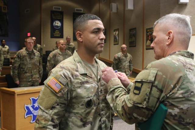 Sgt. 1st Class Donald Swain is awarded the Army Achievement Medal