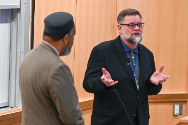 Pastor Bob Roberts Jr and Imam Mohamed Magid speak at the Religious Leader Symposium 9