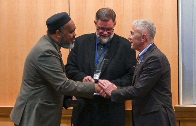 Pastor Bob Roberts Jr and Imam Mohamed Magid speak at the Religious Leader Symposium 9