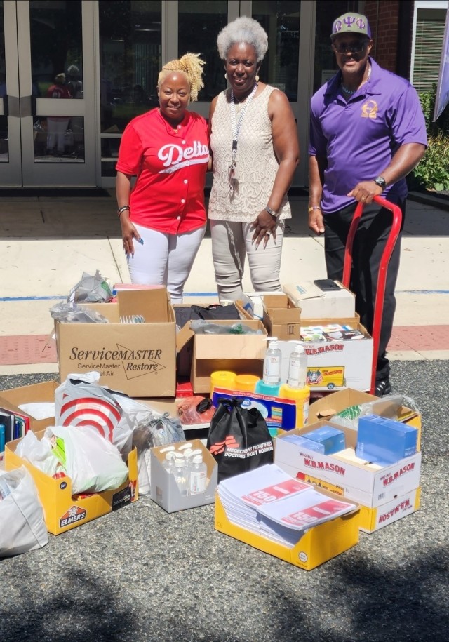 Essie Bennett, Kim Selby, counselor at George Lisbon Elementary School in Aberdeen, Maryland, and Michael Bennett during a recent school supply drive. Essie and Michael Bennett were nominated for Harford County’s Most Beautiful People Award for their extensive community service.