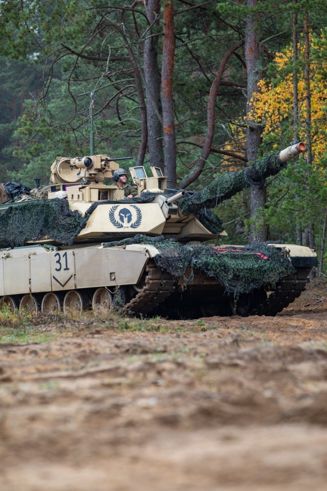 1-66 AR Tanks Roll Through Iron Wolf