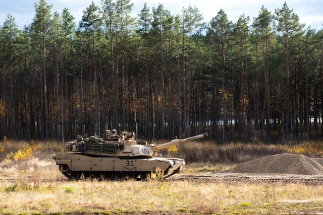 1-66 AR Tanks Roll Through Iron Wolf