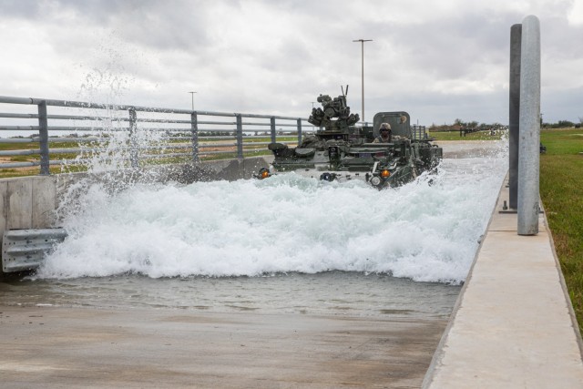 Soldiers from K Troop, 3rd Squadron, 3d Cavalry Regiment negotiate an obstacle on their Stryker at the George H.W. Bush Combat Development Complex in Bryan Texas, Nov. 4, 2022. The crew tested their capabilities in challenging, high intensity terrains while providing telemetric data to the team of engineers at Texas A&M. (U.S. Army photo by Staff Sgt. Evan Ruchotzke)