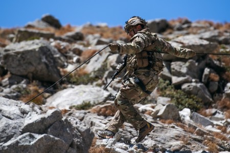 A U.S. Army paratrooper assigned to 2nd Battalion, 503rd Infantry Regiment, 173rd Airborne Brigade rappels down a rock face as soldiers with the Italian Army’s Alpini Brigade assault an objective during a blank-fire exercise as part of Exercise Summer Resolve in the Province of Bolzano, Italy, Oct. 3, 2022.