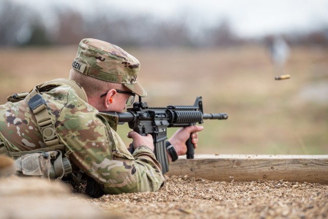 Cadet Tyler Hansen, from Marquette University’s five-person team division, shoots an M4 carbine rifle Friday on Range 7 during the 3rd Brigade ROTC Ranger Challenge competition, which took place Friday and Saturday at locations across Fort Leonard Wood. The weapons challenge was one of the seven events in which Marquette’s five-person team scored highest.  