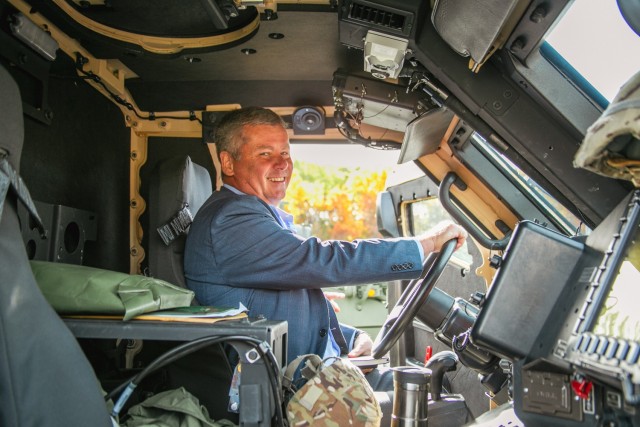 Donald Carter Jr. sitting in the driver seat of a JLTV