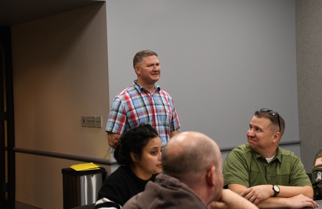 Knowledge Management Qualification Course instructor Chief Warrant Officer 4 William Dickinson reacts to a comment during group discussion following a tour of the National WWI Museum and Memorial, Kansas City, Mo., Oct. 28, 2022. The class learned...