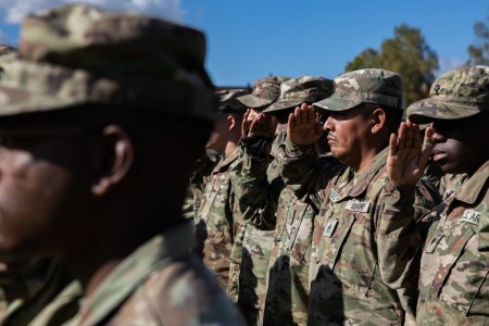 U.S. Soldiers of the 101st Airborne Division Sustainment Brigade salute the U.S. flag during a ceremonial uncasing of their flag, streamers and colors following the unit’s arrival to the Grafenwöhr Training Area in Grafenwöhr, Germany, Oct. 6, 2022. After many years, the 101st Airborne Division once again joins the 1st Infantry Division in Europe to work alongside other NATO allies and regional security partners to provide combat-credible forces to V Corps, America&#39;s forward deployed corps.