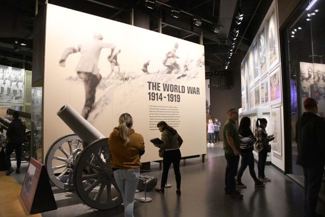 Students from the Knowledge Management Qualification Course begin their tour of the exhibits at the National WWI Museum and Memorial, Kansas City, Mo., Oct. 28, 2022. The class learned about the war, while also comparing and contrasting KM...