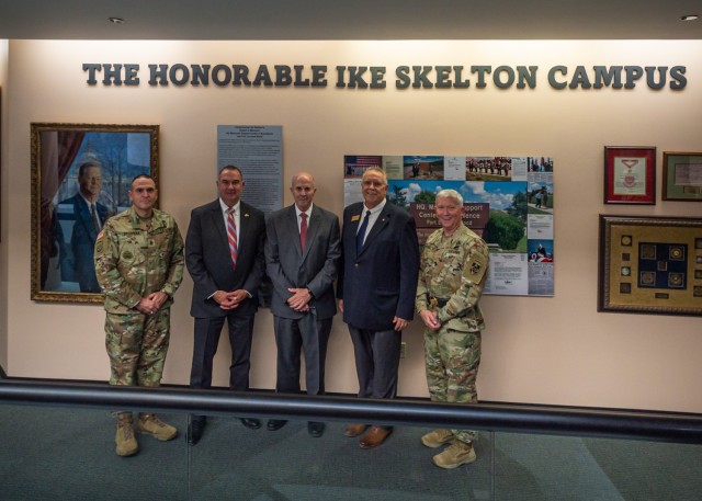 From right: Maj. Gen. James Bonner, Maneuver Support Center of Excellence and Fort Leonard Wood commanding general; Keith Pritchard, civilian aide to the Secretary of the Army, representing western Missouri; Robert Hagedorn, chief of staff for former Missouri Congressman Ike Skelton; Missouri Lieutenant Governor Mike Kehoe; and MSCoE and Fort Leonard Wood Command Sgt. Maj. Randolph Delapena stand in front of a new wall dedication on the second floor of Hoge Hall following a ceremony denoting the MSCoE complex’s name change today to “The Honorable Ike Skelton Campus.” Skelton, originally from Lexington, Missouri, represented his state’s Fourth Congressional District – which includes Fort Leonard Wood – in the U.S. House of Representatives from 1977 to 2011. He was instrumental in the consolidation of the Army Engineer School from Fort Belvoir, Virginia, along with the Military Police and Chemical, Biological, Radiological and Nuclear schools from Fort McClellan, Alabama, to establish the Maneuver Support Center here on Oct. 1, 1999, it was noted during the ceremony. 