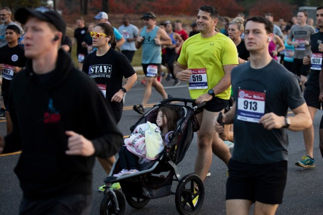 Service Members, Their Families and Civilians Participate in the 26th Annual Fort Bragg 10 Miler