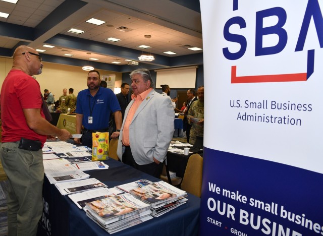 The US Small Business Administration (SBA) had many services to offer Retirees and Veterans, seen here on the right is SBA Lender Relation Specialist, Samuel Maldonado as he assists a Retiree.