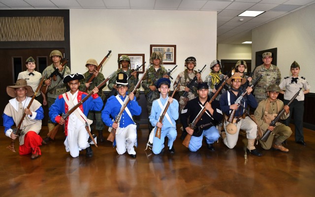 Fourteen students from North Point Military Academy located in Vega Baja, PR displayed historical United States Army Uniforms beginning with a pre-Revolutionary War uniform of the National Guard – War of 1812 – Mexican American War – Civil War up to the Operational Camouflage Pattern uniform worn today by Soldiers.