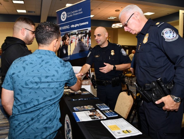 US Customs and Border Protection (CBP) provided information on their recently formed Veterans Support Program and the hiring opportunities available for Veterans, such as these two men, recently returned from deployment and seeking employment.