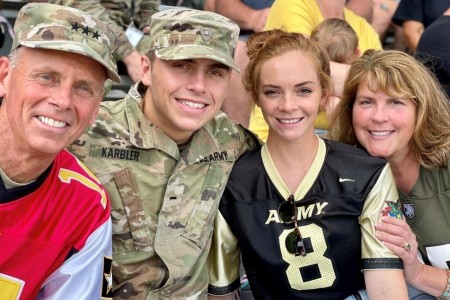 Lt. Gen. Daniel L. Karbler, commanding general of U.S. Army Space and Missile Defense Command, and his family share in one of their favorite family traditions as they attend a U.S. Military Academy football game at Michie Stadium at West Point, New York, in September 2021. From left are: Karbler; his son, Tim, a cadet at West Point; his daughter, Lauren, a first lieutenant serving as the aide-de-camp for the 32nd Air and Missile Defense Command commanding general; and his wife, Leah, a retired Air Force officer. (Courtesy photo)