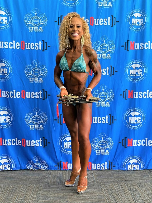 Sgt. 1st Class Renee Arias earns first place in the Wellness category for her class at the NPC Color