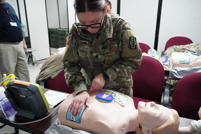 Attaching AED to Mannequin