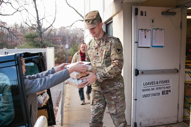 Non-perishable food donation items being dropped off at Loaves & Fishes by USAG Devens RFTA staff. 