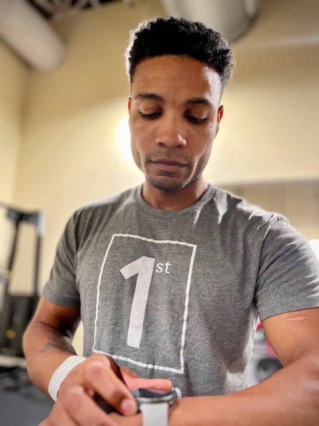 Sgt. 1st Class Markevous Humphrey glances at his watch during a training session near Ft. Bragg, North Carolina on Oct. 5, 2022.  Humphrey is preparing to compete for the World Skate Roller Games in Buenos Aires, Argentina.