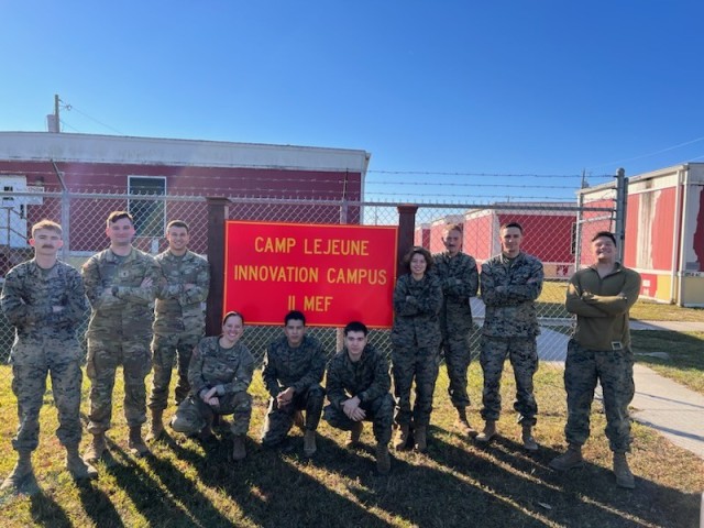 Soldiers and Marines pose for a photo at Camp LeJeune, N.C.