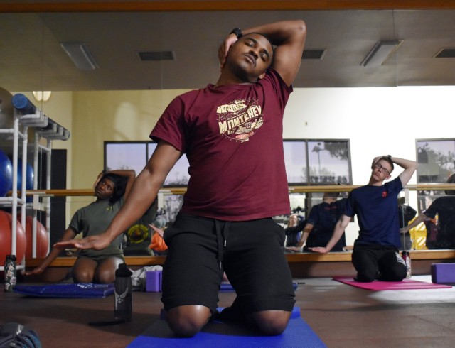 DLIFLC student volunteers as yoga instructor at Presidio of Monterey