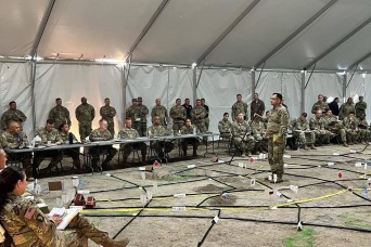Active Army and Guard divisions pair up against hybrid threat in Warfighter exercise