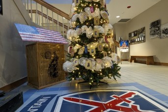 Fort Drum Gold Star family members decorate holiday trees to honor the fallen